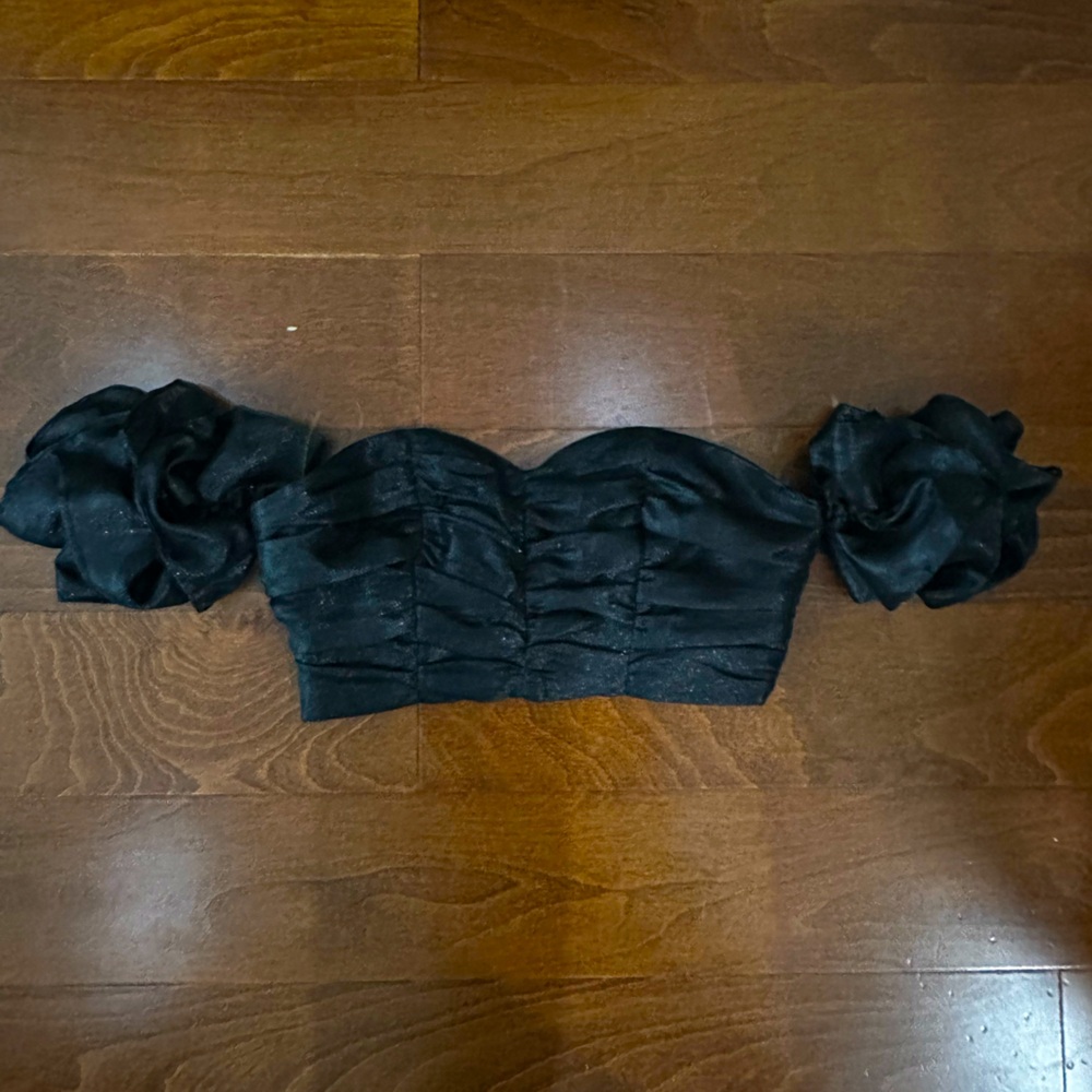 Collective the Label black shimmery crop top.